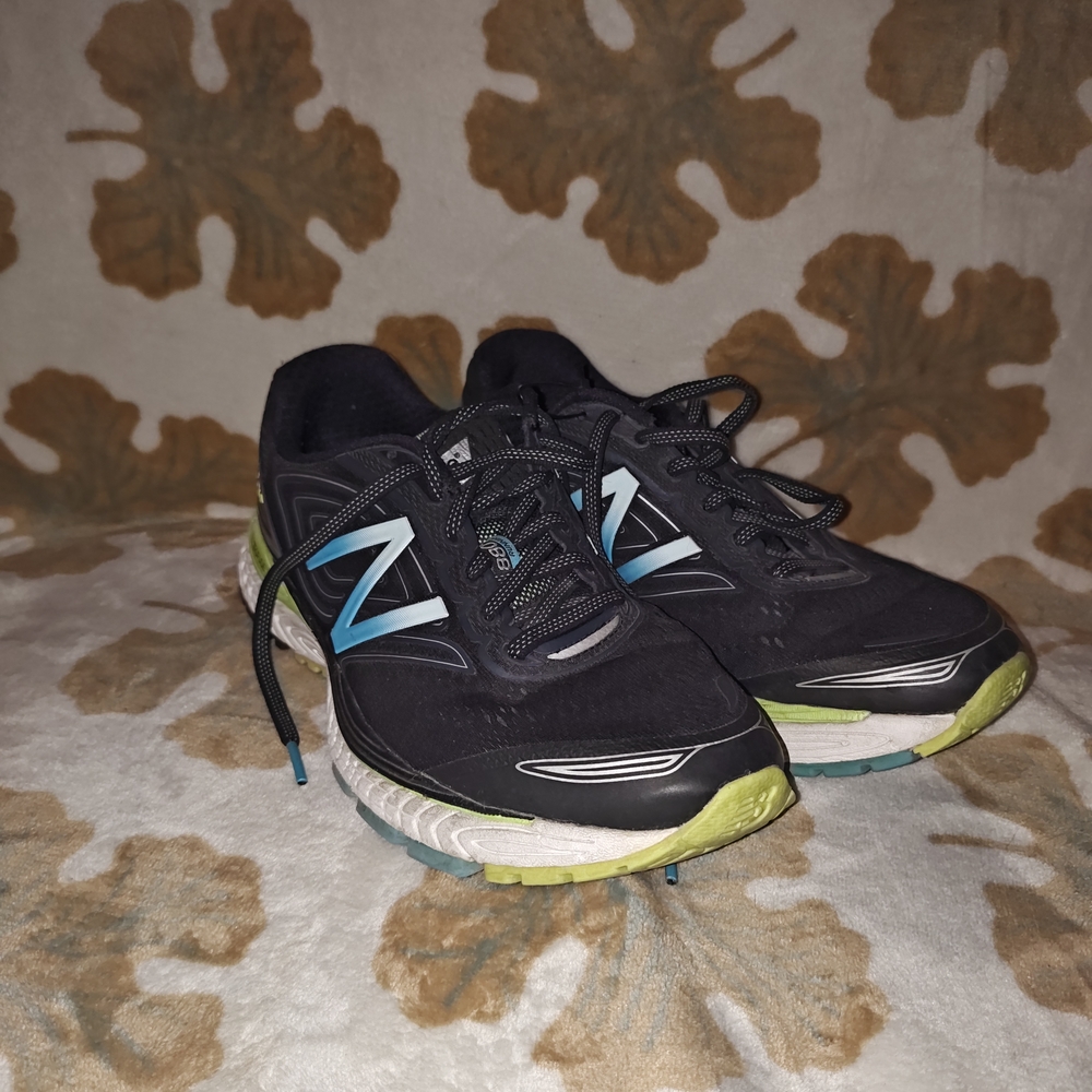 New Balance Men's Black Running Shoes with Blue Accents